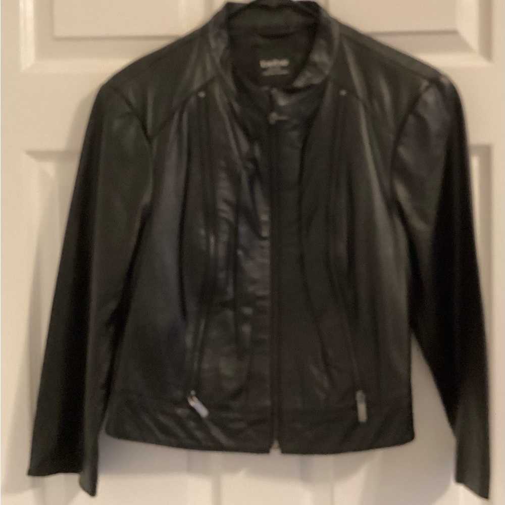 XL Practically new. Genuine leather Moto jacket. No rips no tears.